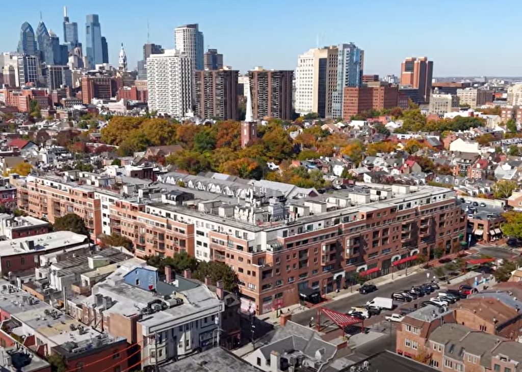 Abbotts Square Condos on 2nd and Lombard with the Philadelphia Skyline in the background